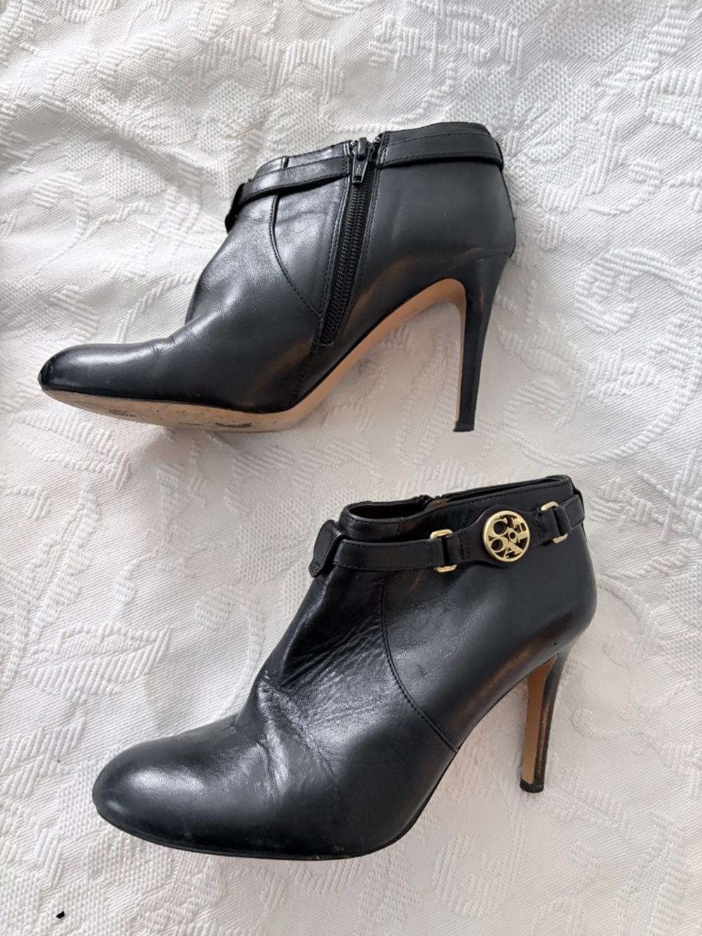 Coach Black Leather Ankle Booties with Gold Medallion